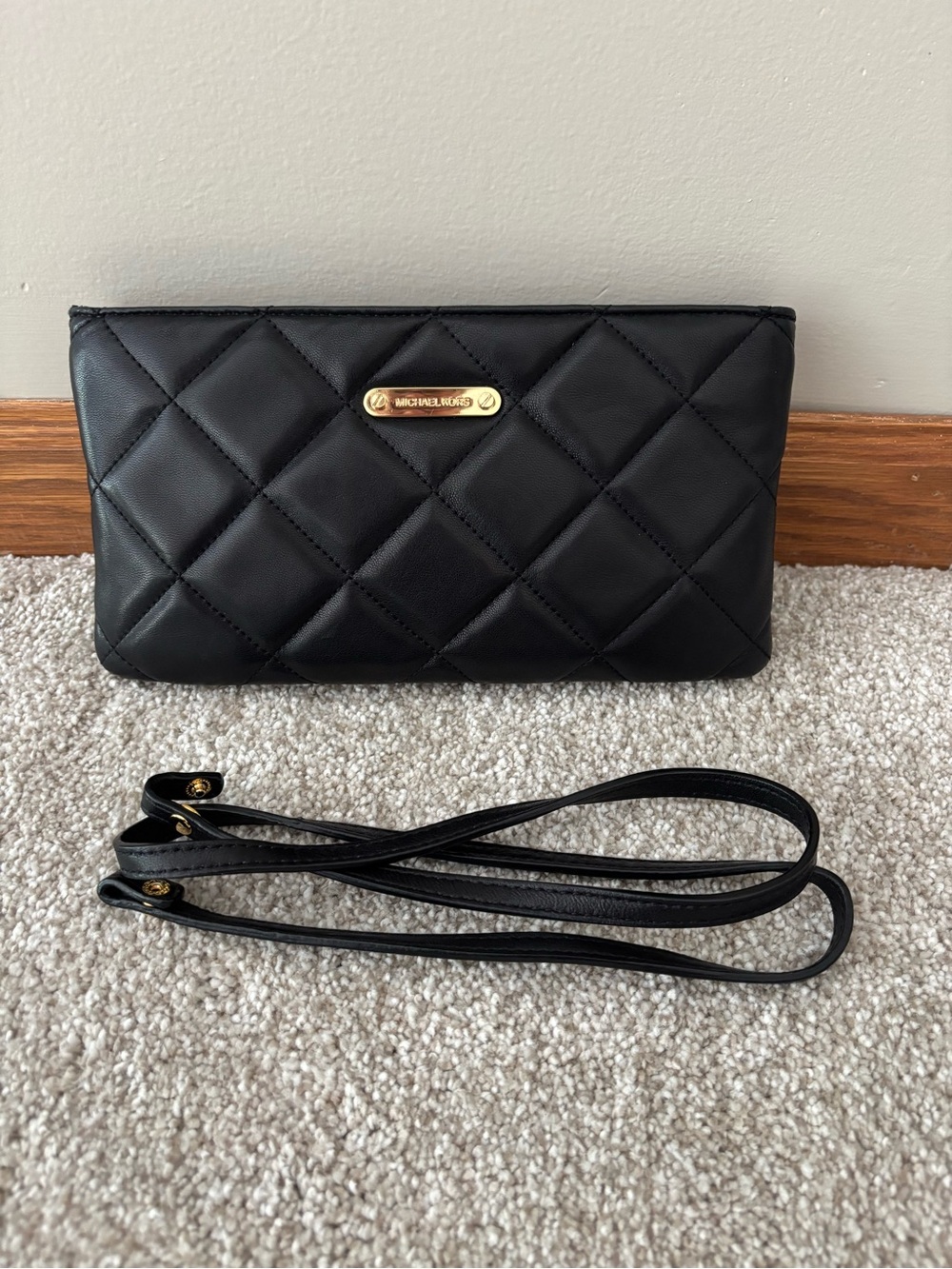 Michael Kors Black Quilted Leather clutch or crossbody with Gold Plate